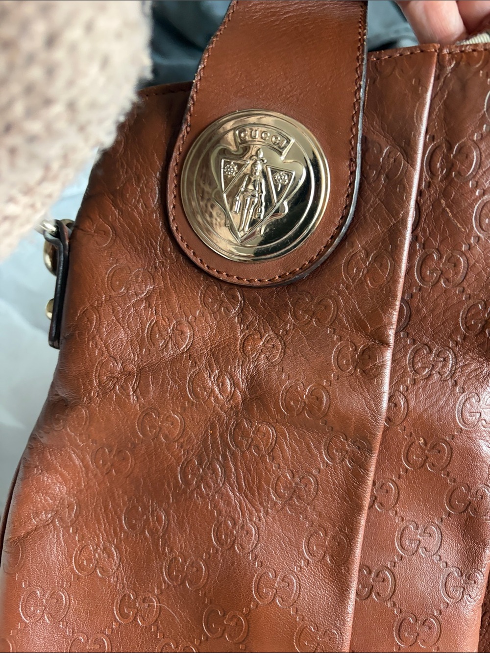 Gucci Cognac Embossed GG Leather Messenger Bag with Gold Medallion